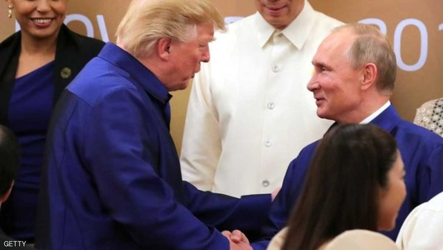 پوتین و ترامپ در نشست اپک با یکدیگر دست دادند/عکس