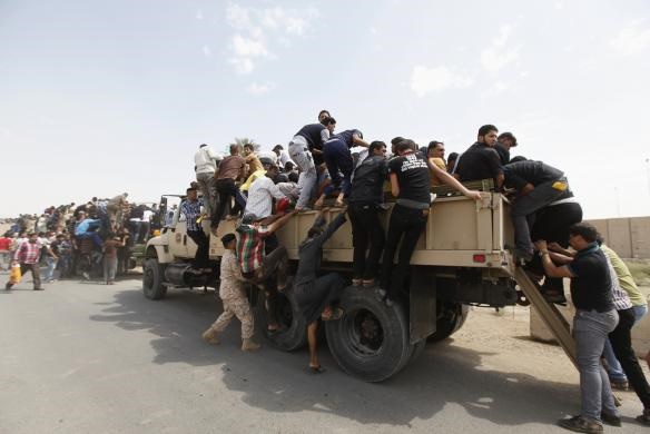 تصاویر عکاس رویترز از هجوم داوطلبان عراقی برای مبارزه با داعش