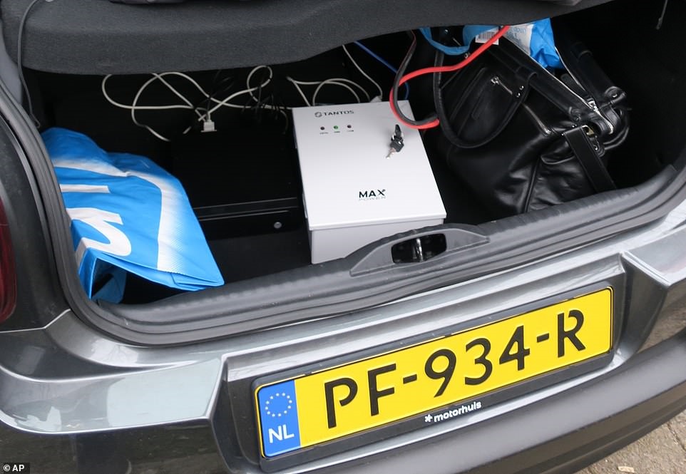 18-10-5-105174763984-6239333-The_boot_of_a_car_filled_with_hacking_equipment_in_the_Citroen_r-m-234_1538668746252.jpg