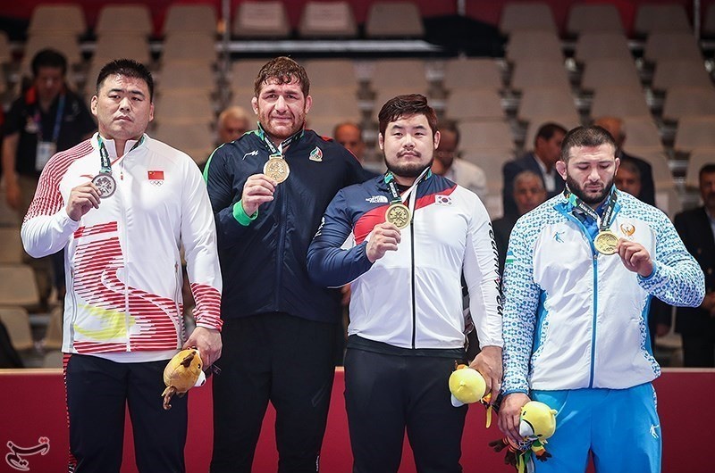  کسب مدال طلای مسابقات کشتی آزاد توسط پرویز هادی در بازی‌های آسیایی ۲۰۱۸ 