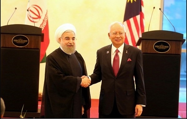 اینفوگرافیک | آمار اقتصادی کشوری که روحانی به آن سفر کرد