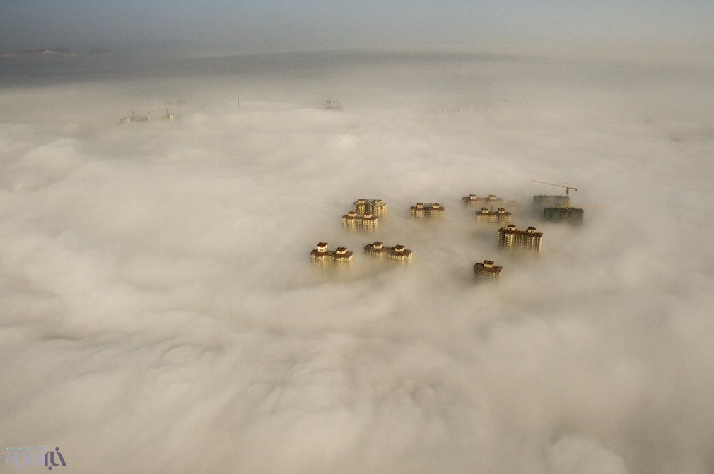 عکس | نمایی زیبا و متفاوت از آسمان مه‌آلود چین
