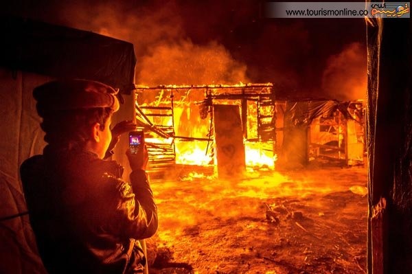 آتش سوزی اردوگاه پناهجویان در فرانسه /عکس