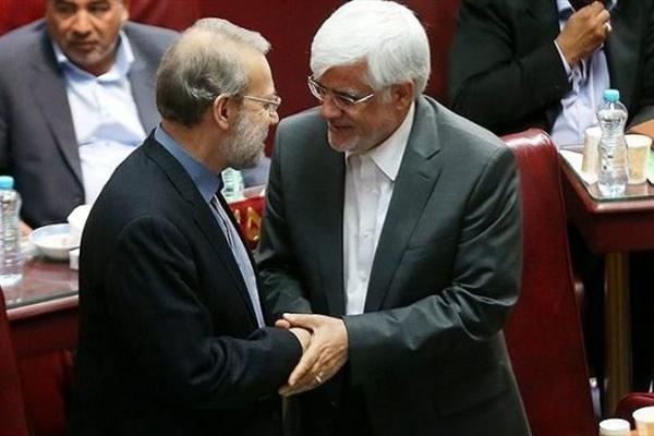 عارف پیروزی لاریجانی را به او تبریک گفت /روبوسی دو رقیب در صحن مجلس/ عکس یادگاری با رییس موقت