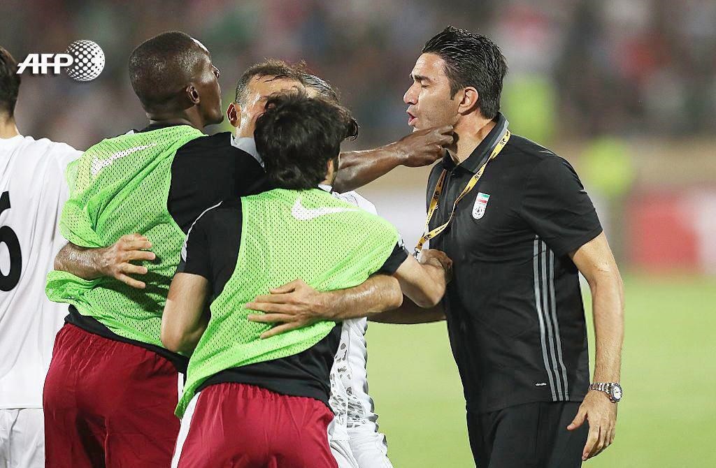 عکس خبرگزاری فرانسه از لحظه درگیری بازیکن قطری با نکونام