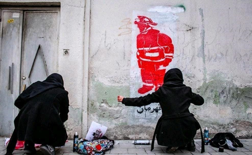 عکس | گرافیتی آتش‌نشان بر دیوارهای تهران