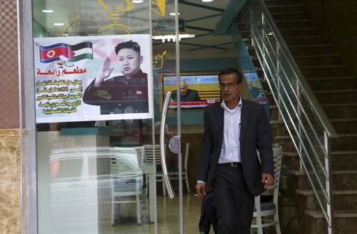 تصاویر | تصویر رهبر کره‌شمالی روی در ورودی یک رستوران در غزه