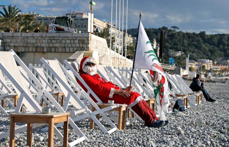تصاویر | بابانوئل‌ها در چهارگوشه دنیا | هنرنمایی زیر آب و روی کوه!
