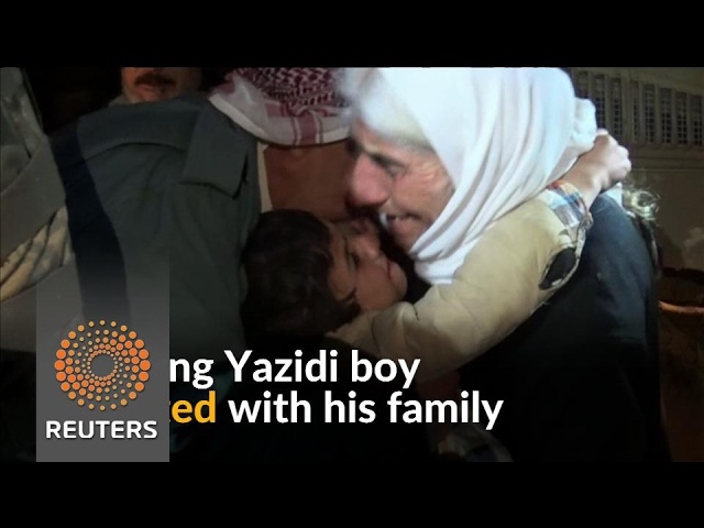 فیلم | لحظه بازگشت کودک فروخته شده توسط داعش به آغوش خانواده‌اش