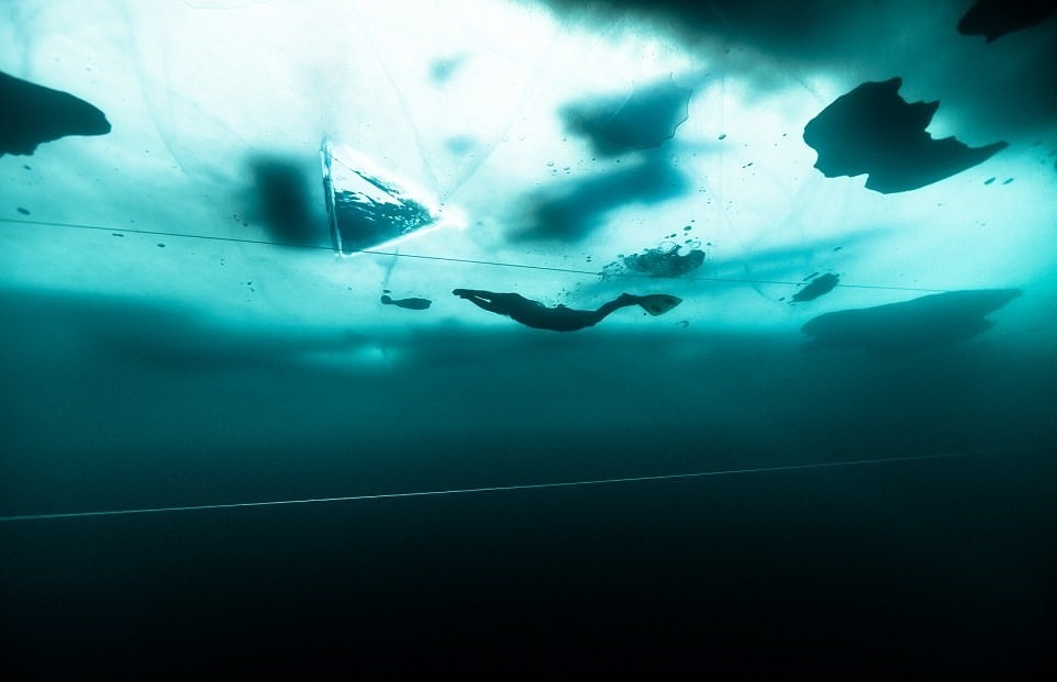 تصاویر | رکوردشکنی شناگر فنلادی با غواصی آزاد زیر رودخانه یخی‎