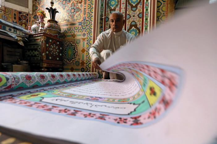 تصاویر | طولانی‌ترین قرآن دست‌نویس جهان