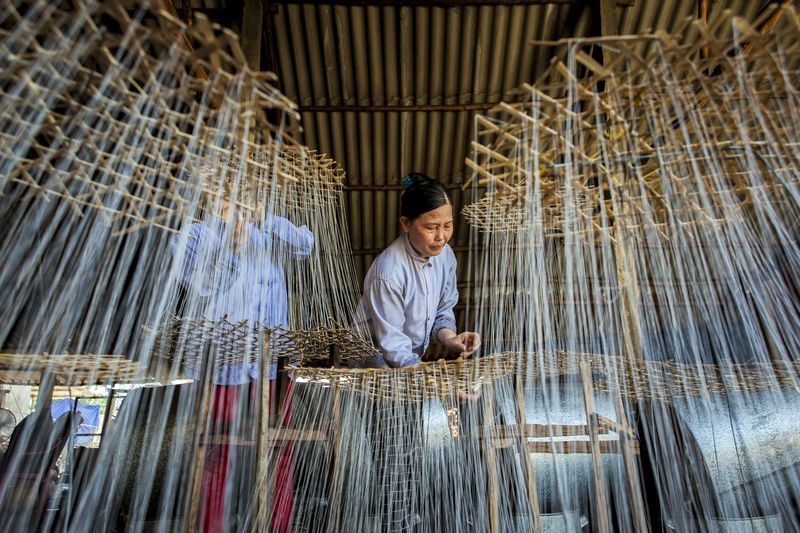 عکس | کارگران کارخانه آبنبات‌سازی ویتنام در عکس روز نشنال جئوگرافیک