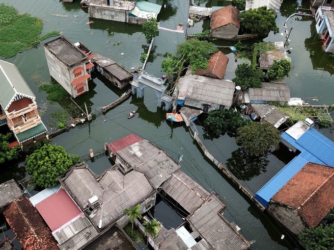 تصاویر | قایق سواری در خیابان‌های ویتنام